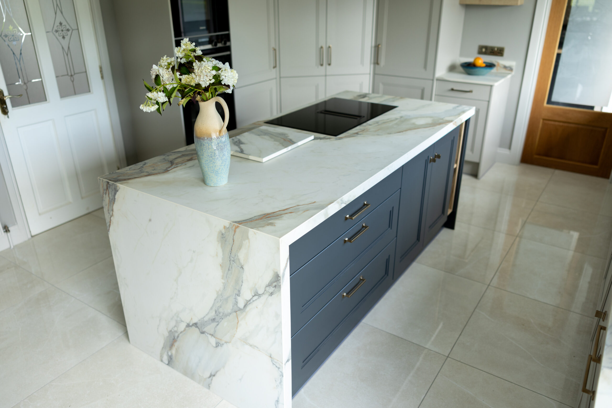Cooktop area with bold veining